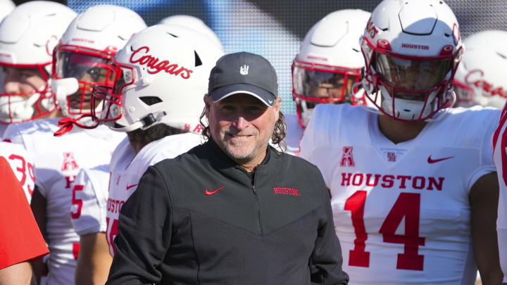 Nov 19, 2022; Greenville, North Carolina, USA; Houston Cougars head coach Dana Holgorsen gets ready to head out onto the field before the game against the East Carolina Pirates at Dowdy-Ficklen Stadium. Mandatory Credit: James Guillory-USA TODAY Sports