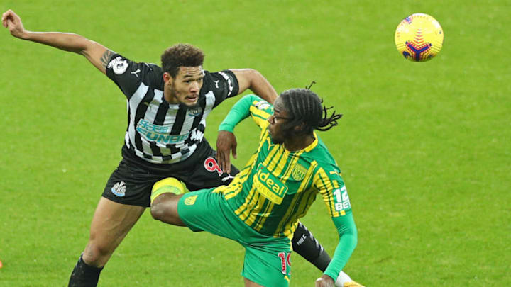 Newcastle United's Joelinton (L). (Photo by JAN KRUGER/POOL/AFP via Getty Images)