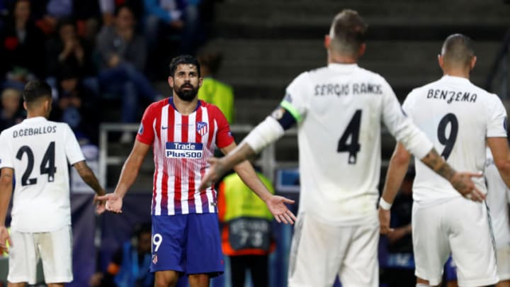 TALLINN, ESTONIA - AUGUST 15: Diego Costa of Atletico Madrid and Sergio Ramos of Real Madrid react during the UEFA Super Cup match between Real Madrid and Atletico Madrid at Lillekula Stadium on August 15, 2018 in Tallinn, Estonia. (Photo by MB Media/Getty Images)