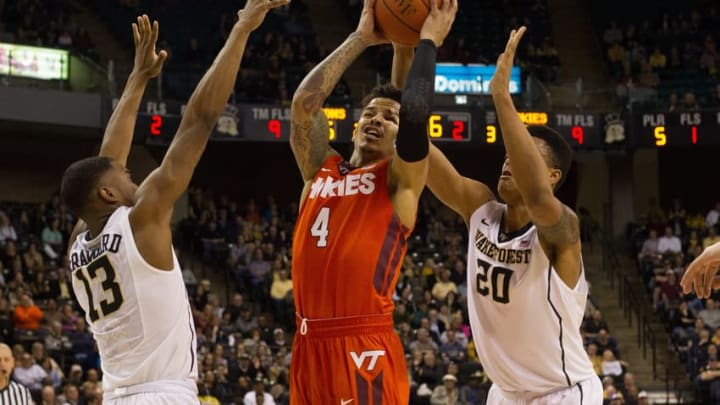 Feb 28, 2016; Winston-Salem, NC, USA; Virginia Tech Hokies guard Seth Allen (4) goes up for a shot in the second half against Wake Forest Demon Deacons guard Bryant Crawford (13) at Lawrence Joel Veterans Memorial Coliseum. Virginia Tech defeated Wake Forest 81-74. Mandatory Credit: Jeremy Brevard-USA TODAY Sports