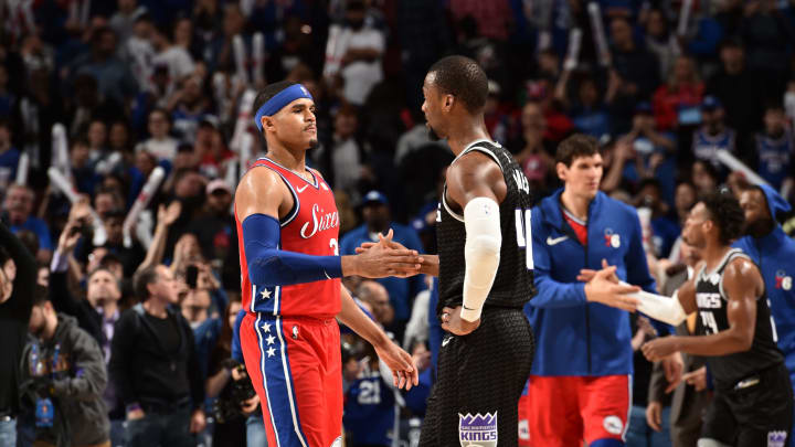 PHILADELPHIA, PA – MARCH 15: Tobias Harris #33 of the Philadelphia 76ers and Harrison Barnes #40 of the Sacramento Kings high-five after a game on March 15, 2019 at the Wells Fargo Center in Philadelphia, Pennsylvania NOTE TO USER: User expressly acknowledges and agrees that, by downloading and/or using this Photograph, user is consenting to the terms and conditions of the Getty Images License Agreement. Mandatory Copyright Notice: Copyright 2019 NBAE (Photo by David Dow/NBAE via Getty Images)