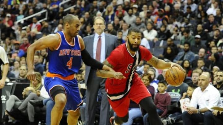 Mar 19, 2016; Washington, DC, USA; Washington Wizards forward Markieff Morris (5) dribbles a New York Knicks guard Arron Afflalo (4) defends during the second half at Verizon Center. The Washington Wizards won 99 - 89. Mandatory Credit: Brad Mills-USA TODAY Sports