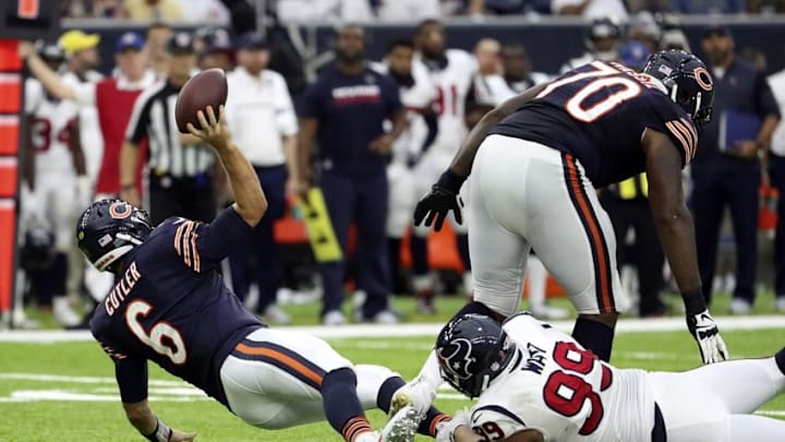 Sep 11, 2016; Houston, TX, USA; Houston Texans defensive end J.J. Watt (99) grabs the leg of Chicago Bears quarterback Jay Cutler (6) during the second half at NRG Stadium. Mandatory Credit: Kevin Jairaj-USA TODAY Sports