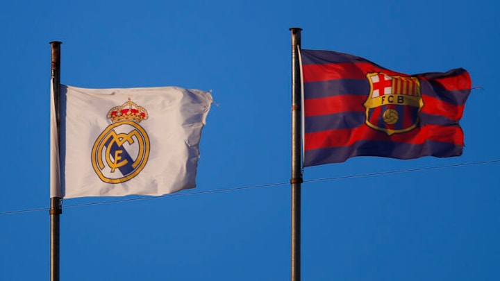 VALENCIA, SPAIN - JANUARY 30: Real Madrid and FC Barcelona flags are seen during the La Liga Santander match between Valencia CF and Elche CF at Estadio Mestalla on January 30, 2021 in Valencia, Spain. Sporting stadiums around Spain remain under strict restrictions due to the Coronavirus Pandemic as Government social distancing laws prohibit fans inside venues resulting in games being played behind closed doors. (Photo by Eric Alonso/Getty Images)