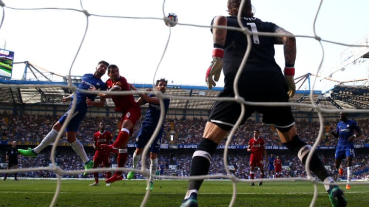 LONDON, ENGLAND - MAY 06: Olivier Giroud of Chelsea scores his sides first goal past Loris Karius of Liverpool during the Premier League match between Chelsea and Liverpool at Stamford Bridge on May 6, 2018 in London, England. (Photo by Clive Rose/Getty Images)