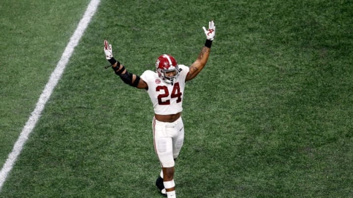 ATLANTA, GA - JANUARY 08: Terrell Lewis #24 of the Alabama Crimson Tide celebrates beating the Georgia Bulldogs in overtime and winning the CFP National Championship presented by AT&T at Mercedes-Benz Stadium on January 8, 2018 in Atlanta, Georgia. Alabama won 26-23. (Photo by Mike Zarrilli/Getty Images)