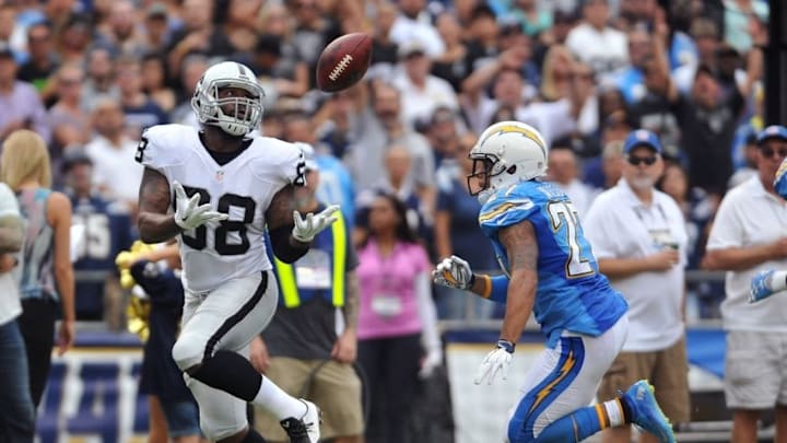 Oct 25, 2015; San Diego, CA, USA; Oakland Raiders tight end Clive Walford (88) catches a touchdown pass from quarterback Derek Carr (not pictured) during the second quarter against the San Diego Chargers at Qualcomm Stadium. Mandatory Credit: Orlando Ramirez-USA TODAY Sports