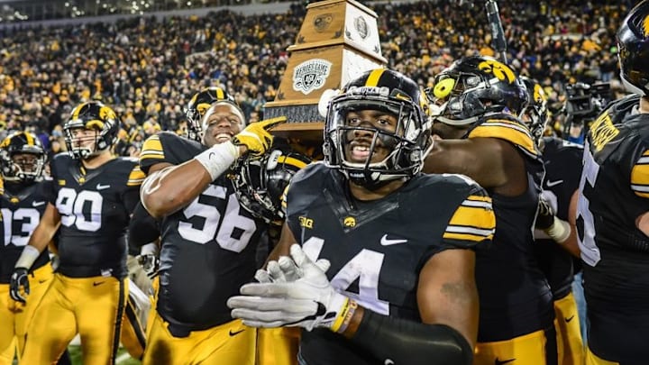 Nov 25, 2016; Iowa City, IA, USA; Iowa Hawkeyes defensive back Desmond King (14) celebrates after the game against the Nebraska Cornhuskers at Kinnick Stadium. Iowa won 40-10 and secured the Heroes Game trophy. Mandatory Credit: Jeffrey Becker-USA TODAY Sports