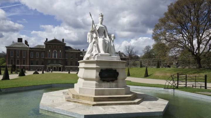 A statue of Queen Victoria, sculpted by her daughter, Louise, outside Kensington Palace.