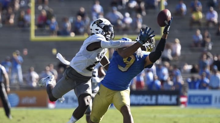 Oct 31, 2015; Pasadena, CA, USA; UCLA Bruins wide receiver Tedric Thompson (9) is unable to make a catch defended by Colorado Buffaloes defensive back Jaleel Wadood (left) during the fourth quarter at Rose Bowl. The UCLA Bruins won 35-31. Mandatory Credit: Kelvin Kuo-USA TODAY Sports