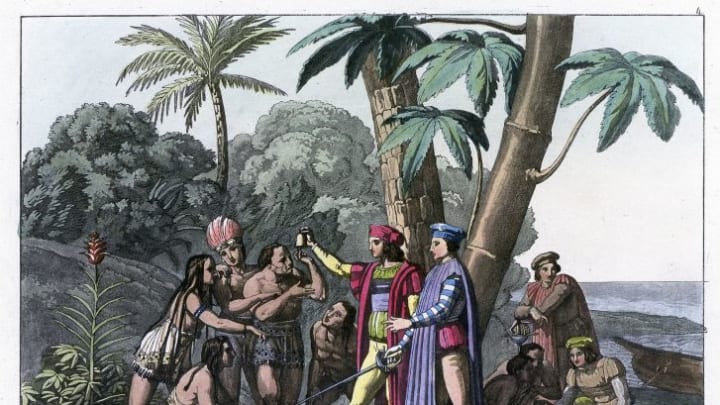 An illustration of Christopher Columbus interacting with Indigenous people.