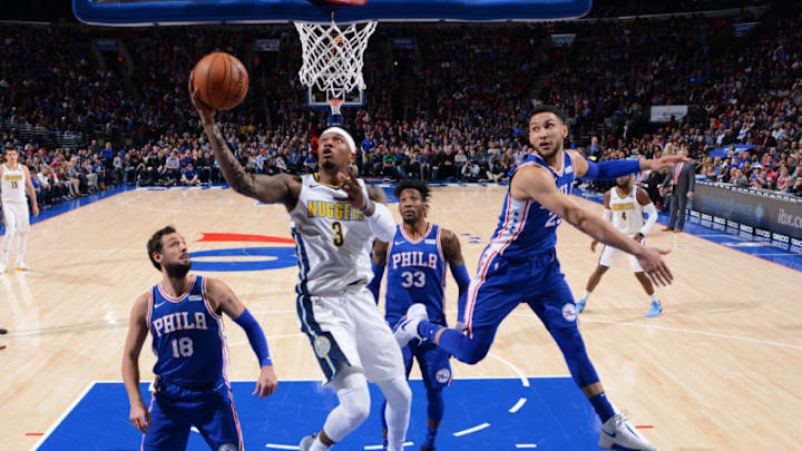 PHILADELPHIA,PA - MARCH 26 : Torrey Craig #3 of the Denver Nuggets goes up for the layup against the Philadelphia 76ers at Wells Fargo Center on March 26, 2018 in Philadelphia, Pennsylvania NOTE TO USER: User expressly acknowledges and agrees that, by downloading and/or using this Photograph, user is consenting to the terms and conditions of the Getty Images License Agreement. Mandatory Copyright Notice: Copyright 2018 NBAE (Photo by Jesse D. Garrabrant/NBAE via Getty Images)