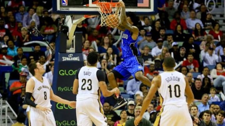 Nov 3, 2015; New Orleans, LA, USA; Orlando Magic guard Elfrid Payton (4) dunks against the New Orleans Pelicans during the second half of a game at the Smoothie King Center. The Magic defeated the Pelicans 103-94. Mandatory Credit: Derick E. Hingle-USA TODAY Sports
