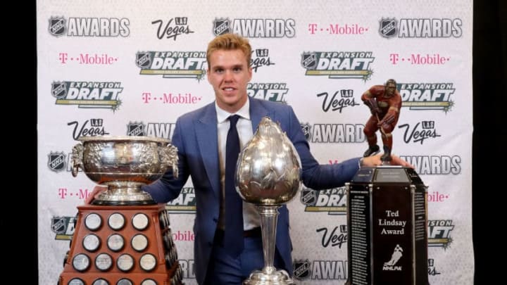 LAS VEGAS, NV - JUNE 21: Connor McDavid of the Edmonton Oilers poses with the Art Ross Trophy, Hart Memorial Trophy and the Ted Lindsay Award after the 2017 NHL Awards and Expansion Draft at T-Mobile Arena on June 21, 2017 in Las Vegas, Nevada. (Photo by Bruce Bennett/Getty Images)