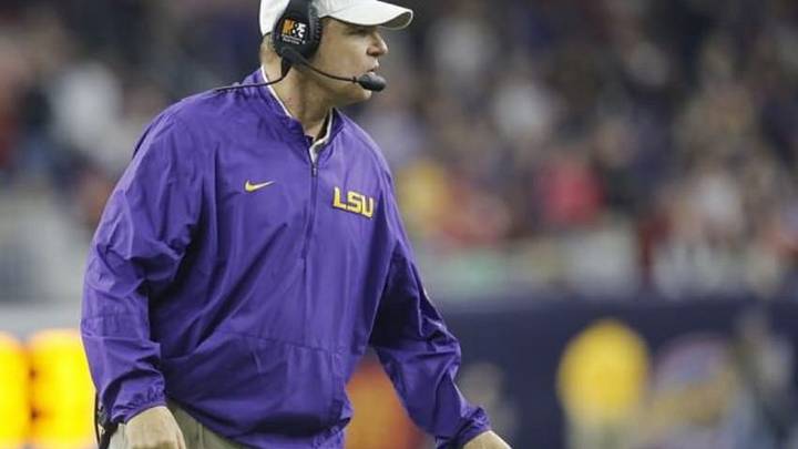 Dec 29, 2015; Houston, TX, USA; LSU Tigers head coach Les Miles watches play against the Texas Tech Red Raiders in the first quarter at NRG Stadium. Mandatory Credit: Thomas B. Shea-USA TODAY Sports
