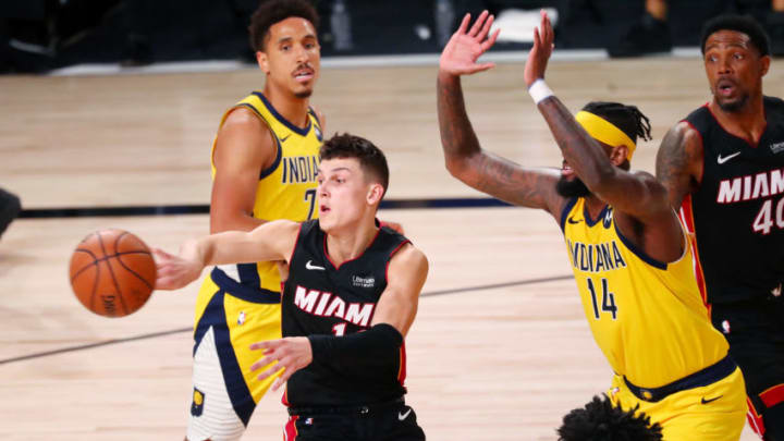 Tyler Herro #14 of the Miami Heat passes against JaKarr Sampson #14 of the Indiana Pacers(Photo by Kim Klement - Pool/Getty Images)