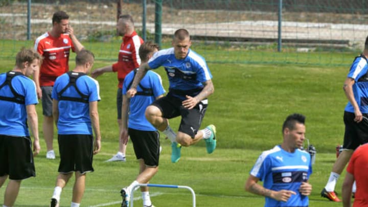 Slovakia’s player Martin Skrtel (C) jumps during a training session in Senec, Slovakia, on June 2, 2016, as part of the team’s preparation for the upcoming Euro 2016 European football championship. / AFP / SAMUEL KUBANI (Photo credit should read SAMUEL KUBANI/AFP/Getty Images)