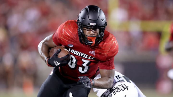 LOUISVILLE, KENTUCKY - SEPTEMBER 17: Marshon Ford #83 of the Louisville Cardinals runs with the ball after catching a pass for a touchdown against the UCF Knights at Cardinal Stadium on September 17, 2021 in Louisville, Kentucky. (Photo by Andy Lyons/Getty Images)