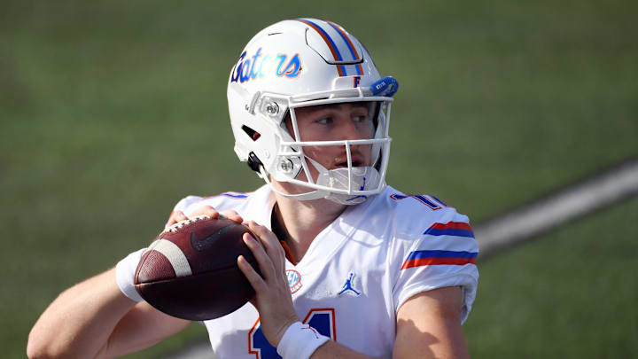 Nov 21, 2020; Nashville, Tennessee, USA; Florida Gators quarterback Kyle Trask (11) warms up before the game against the Vanderbilt Commodores at Vanderbilt Stadium. Mandatory Credit: Christopher Hanewinckel-USA TODAY Sports