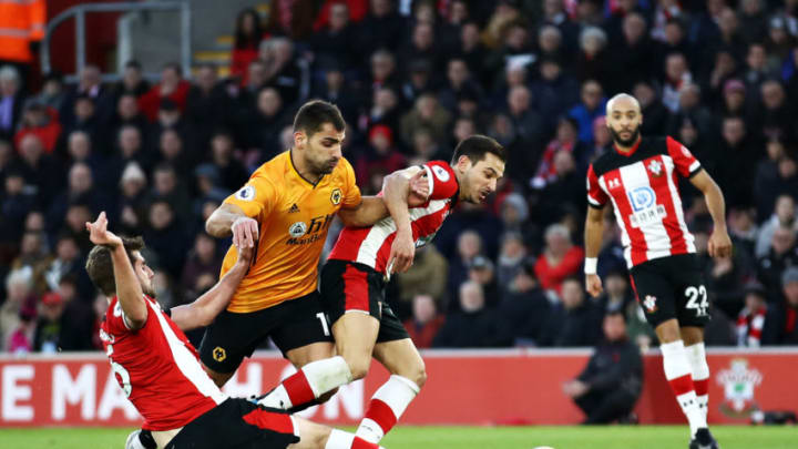 SOUTHAMPTON, ENGLAND – JANUARY 18: Jonny Otto of Wolverhampton Wanderers is fouled in the penalty area by Jack Stephens and Cedric Soares both of Southampton during the Premier League match between Southampton FC and Wolverhampton Wanderers at St Mary’s Stadium on January 18, 2020 in Southampton, United Kingdom. (Photo by Bryn Lennon/Getty Images)