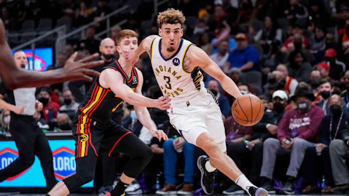 Feb 8, 2022; Atlanta, Georgia, USA; Indiana Pacers guard Chris Duarte (3) dribbles past Atlanta Hawks guard Kevin Huerter (3) during the first half at State Farm Arena. Mandatory Credit: Dale Zanine-USA TODAY Sports