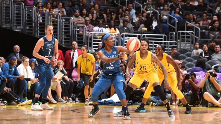 LOS ANGELES, CA – JUNE 3: Alexis Jones #12 of the Minnesota Lynx handles the ball against the Los Angeles Sparks on June 3, 2018 at STAPLES Center in Los Angeles, California. NOTE TO USER: User expressly acknowledges and agrees that, by downloading and or using this photograph, User is consenting to the terms and conditions of the Getty Images License Agreement. Mandatory Copyright Notice: Copyright 2018 NBAE (Photo by Adam Pantozzi/NBAE via Getty Images)