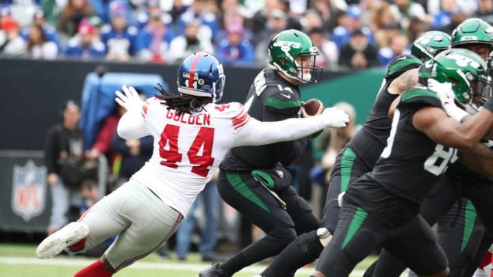 Markus Golden, New York Giants. Sam Darnold, New York Jets. (Photo by Al Bello/Getty Images)