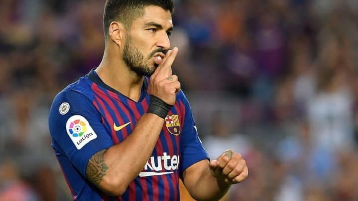Barcelona's Uruguayan forward Luis Suarez celebrates after scoring a penalty during the Spanish league football match between FC Barcelona and SD Huesca at the Camp Nou stadium in Barcelona on September 2, 2018. (Photo by LLUIS GENE / AFP) (Photo credit should read LLUIS GENE/AFP/Getty Images)