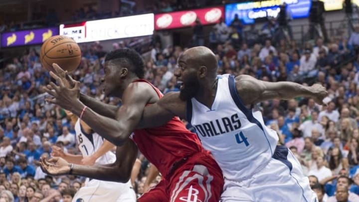 Oct 28, 2016; Dallas, TX, USA; Houston Rockets center Clint Capela (15) and Dallas Mavericks forward Quincy Acy (4) fight for the loose ball during the first half at the American Airlines Center. Mandatory Credit: Jerome Miron-USA TODAY Sports