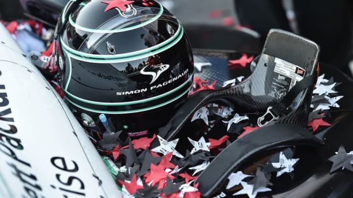 Confetti adorns the car and helmet of Simon Pagenaud after his victory on Sunday. Photo Credit: Chris Owens/Courtesy of IndyCar