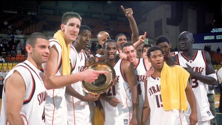 25 Nov 2000: The Syracuse Orangeman celebrates after the Great Alaska Shootout against the Missouri Tigers at the Sullivan Arena in Anchorage, Alaska. The Orangemen defeated the Tigers 84-62.Mandatory Credit: Otto Greule Jr. /Allsport