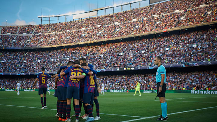 BARCELONA, SPAIN - SEPTEMBER 18: Lionel Messi of Barcelona celebrates with his teammates after scoring the first goal during the Group B match of the UEFA Champions League between FC Barcelona and PSV at Camp Nou on September 18, 2018 in Barcelona, Spain. (Photo by Quality Sport Images/Getty Images)