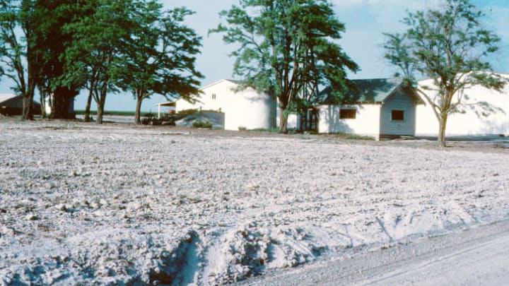 Ash from the May 18, 1980 eruption of Mount St. Helens covers the ground at a farm located 180 miles from the volcano.