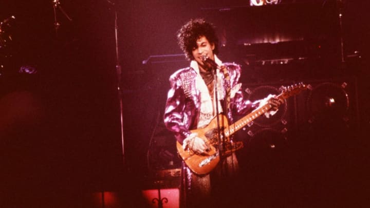 Prince performs during the Purple Rain tour in 1985.