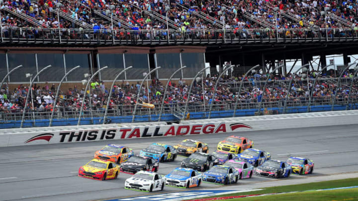 TALLADEGA, AL - OCTOBER 15: Brad Keselowski, driver of the #2 Miller Lite Ford, and Joey Logano, driver of the #22 Shell Pennzoil Ford, lead a pack of cars during the Monster Energy NASCAR Cup Series Alabama 500 at Talladega Superspeedway on October 15, 2017 in Talladega, Alabama. (Photo by Jared C. Tilton/Getty Images)