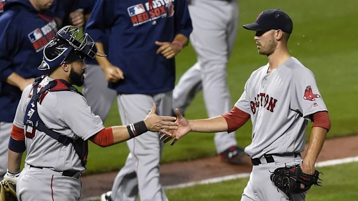 Sep 19, 2016; Baltimore, MD, USA; Boston Red Sox starting pitcher Rick Porcello (22) celebrates with catcher Sandy Leon (3) after defeating Baltimore Orioles -5-2 at Oriole Park at Camden Yards. Mandatory Credit: Tommy Gilligan-USA TODAY Sports
