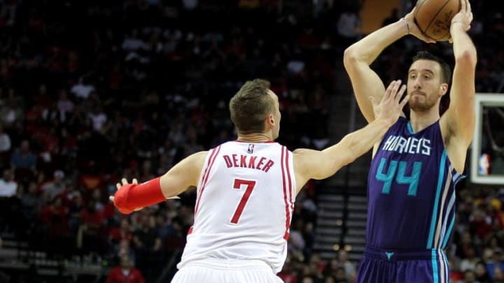 Jan 10, 2017; Houston, TX, USA; Charlotte Hornets forward Frank Kaminsky (44) handles the ball outside while Houston Rockets forward Sam Dekker (7) defends during the fourth quarter at Toyota Center. Mandatory Credit: Erik Williams-USA TODAY Sports