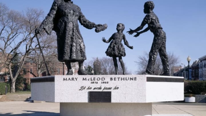 Mary McLeod Bethune depicted with a couple young students in Lincoln Park.