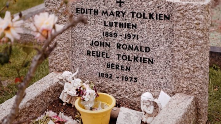 The burial site of Edith and J.R.R. Tolkien, with "Luthien" and "Beren" inscribed on the headstone.