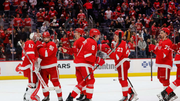 Oct 22, 2023; Detroit, Michigan, USA; Detroit Red Wings celebrate after defeating the Calgary Flames at Little Caesars Arena. Mandatory Credit: Rick Osentoski-USA TODAY Sports