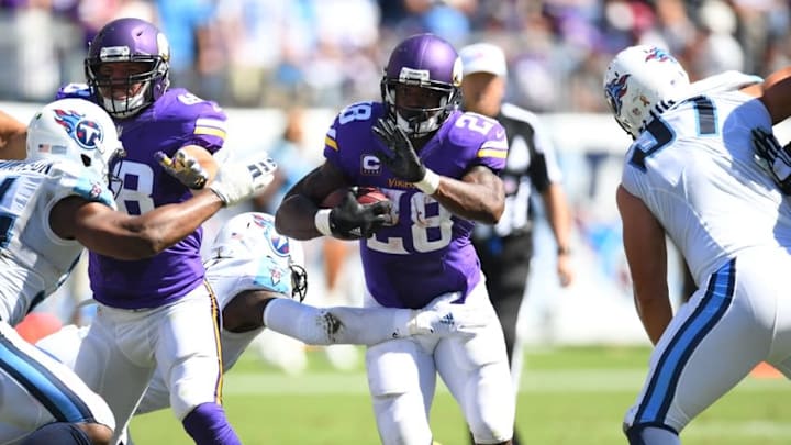 Sep 11, 2016; Nashville, TN, USA; Minnesota Vikings running back Adrian Peterson (28) runs for a short gain during the second half against the Tennessee Titans at Nissan Stadium. Mandatory Credit: Christopher Hanewinckel-USA TODAY Sports