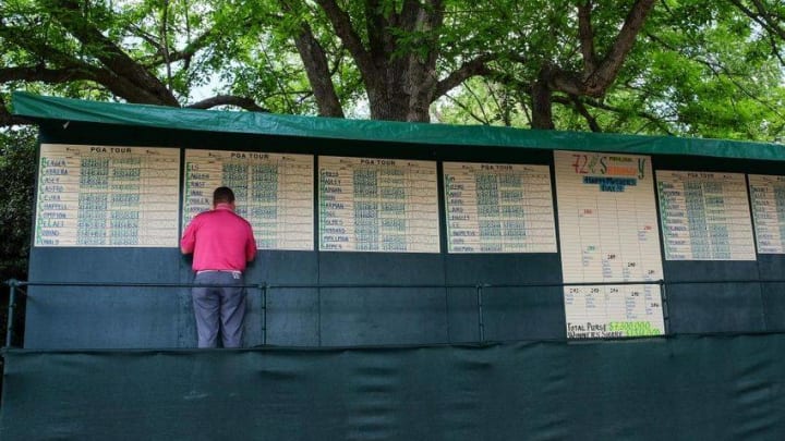 May 8, 2016; Charlotte, NC, USA; A PGA official writes up the scores during the final round of the 2016 Wells Fargo Championship at Quail Hollow Club. Mandatory Credit: Jim Dedmon-USA TODAY Sports