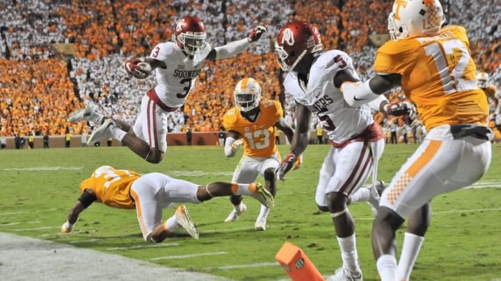 Sep 12, 2015; Knoxville, TN, USA; Oklahoma Sooners wide receiver Sterling Shepard (3) dives over Tennessee Volunteers defensive back Brian Randolph (37) to score the winning touchdown during double overtime at Neyland Stadium. Oklahoma won 31-24. Mandatory Credit: Jim Brown-USA TODAY Sports