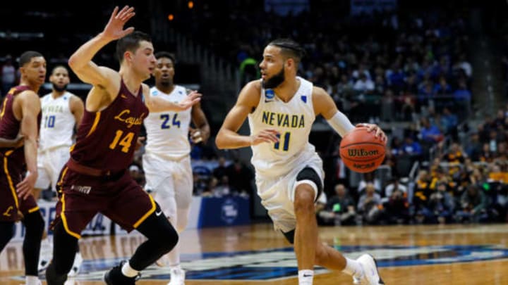 ATLANTA, GA – MARCH 22: Cody Martin #11 of the Nevada Wolf Pack is defended by Ben Richardson #14 of the Loyola Ramblers in the second half during the 2018 NCAA Men’s Basketball Tournament South Regional at Philips Arena on March 22, 2018 in Atlanta, Georgia. (Photo by Kevin C. Cox/Getty Images)