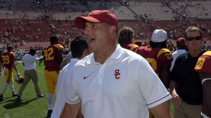 Sep 10, 2016; Los Angeles, CA, USA; USC Trojans head coach Clay Helton celebrates after a NCAA football game against the Utah State Aggies at Los Angeles Memorial Coliseum. USC defeated Utah State 45-7. Mandatory Credit: Kirby Lee-USA TODAY Sports