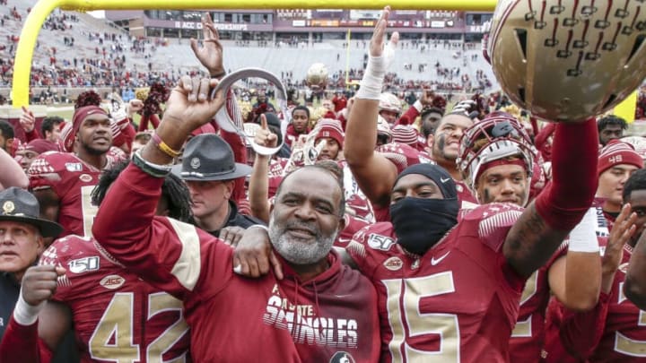 TALLAHASSEE, FL - NOVEMBER 16: Interim head coach Odell Haggins of the Florida State Seminoles celebrates with his team in the end zone after the game against the Alabama State Hornets at Doak Campbell Stadium on Bobby Bowden Field on November 16, 2019 in Tallahassee, Florida. The Seminoles defeated The Hornets 49 to 12. (Photo by Don Juan Moore/Getty Images)
