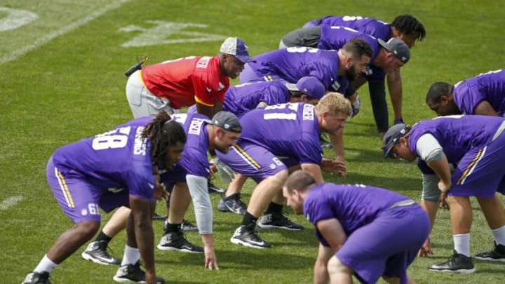 Aug 1, 2016; Mankato, MN, USA; Minnesota Vikings quarterback Teddy Bridgewater (5) sets up behind his offensive line in training camp at Minnesota State University. Mandatory Credit: Bruce Kluckhohn-USA TODAY Sports