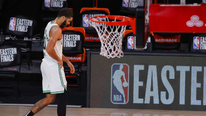 LAKE BUENA VISTA, FLORIDA - SEPTEMBER 27: Jayson Tatum #0 of the Boston Celtics walks off the court after losing to the Miami Heat in Game Six of the Eastern Conference Finals during the 2020 NBA Playoffs at AdventHealth Arena at the ESPN Wide World Of Sports Complex on September 27, 2020 in Lake Buena Vista, Florida. NOTE TO USER: User expressly acknowledges and agrees that, by downloading and or using this photograph, User is consenting to the terms and conditions of the Getty Images License Agreement. (Photo by Kevin C. Cox/Getty Images)