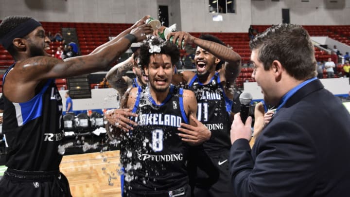 LAKELAND, FL - FEBRUARY 5: BJ Johnson #2 and Braian Angola-Rodas #11 of the Lakeland Magic pour Gatorade on Jeremiah Hill #8 after the game against the Maine Red Claws on February 5, 2019 at RP Funding Center in Lakeland, Florida. NOTE TO USER: User expressly acknowledges and agrees that, by downloading and or using this photograph, User is consenting to the terms and conditions of the Getty Images License Agreement. Mandatory Copyright Notice: Copyright 2019 NBAE (Photo by Gary Bassing/NBAE via Getty Images)