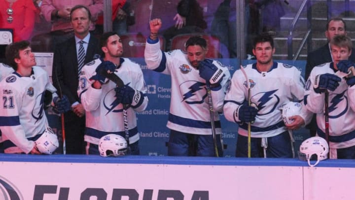 The Tampa Bay Lightning's J.T. Brown protests during the national anthem before the start of a game against the Florida Panthers at the BB